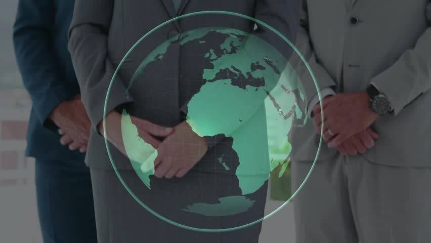 Business team reacting to spinning globe raising thumbs-up celebrating global teamwork. Corporate, collaboration, innovation, leadership, global, success, professionalism