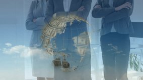 Three businesswomen standing arms crossed fading 3D dollar globe rotating from Africa to Americas. Corporate, finance, globalization, teamwork, innovation, professionalism, modern - Powered by Shutterstock - Get 15% off with code: PIKWIZARD15