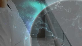 Senior doctor touching chin tracking rotating hologram globe mapping global medical data lines. Medical, technology, futurism, innovation, biomedical, network, analysis - Powered by Shutterstock - Get 15% off with code: PIKWIZARD15