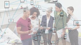 Colleagues leaning over document and showing tablet in tech office, forming network of device icons. Collaboration, teamwork, digital, connectivity, innovation, technology, future - Powered by Shutterstock - Get 15% off with code: PIKWIZARD15