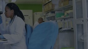 Woman scientist positioning slide animating tech overlay analyzing cells while male pipetting fluid. Research, innovation, technology, collaboration, biomolecular, clinical, advancement - Powered by Shutterstock - Get 15% off with code: PIKWIZARD15