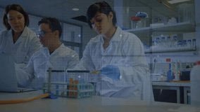 Lab scientists analyzing data as blue HUD overlays emerging, scrolling and pipetting, supervising. Research, innovation, technology, collaboration, analysis, digital, laboratory - Powered by Shutterstock - Get 15% off with code: PIKWIZARD15