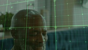 Professional man picking up smartphone and managing workflow beside laptop under green grid overlay. Technology, communication, business, modern, professional, workplace, digital - Powered by Shutterstock - Get 15% off with code: PIKWIZARD15