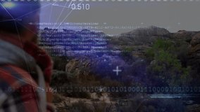 Male hiker standing riverbank as data streams sliding in and powering animated terrain mapping tech. Adventure, exploration, technology, innovation, rugged, wilderness, visualization - Powered by Shutterstock - Get 15% off with code: PIKWIZARD15