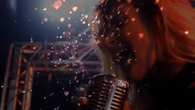 Blonde music vocalist singing into mic causing heart confetti, guitarist strumming under spotlights. Performance, live music, concert, stage, artist, melody, entertainment - Powered by Shutterstock - Get 15% off with code: PIKWIZARD15