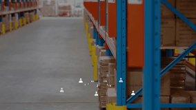 Mature warehouse worker entering aisle carrying box aligning while checking red bin for inventory. Industrial, logistics, organization, efficiency, routine, teamwork, storage - Powered by Shutterstock - Get 15% off with code: PIKWIZARD15