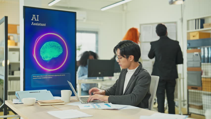 Focused business professional working in coworking space with AI assistance, virtual agent, big data analysis, laptop display screen, modern office technology, innovation, digital transformation - Powered by Shutterstock - Get 15% off with code: PIKWIZARD15