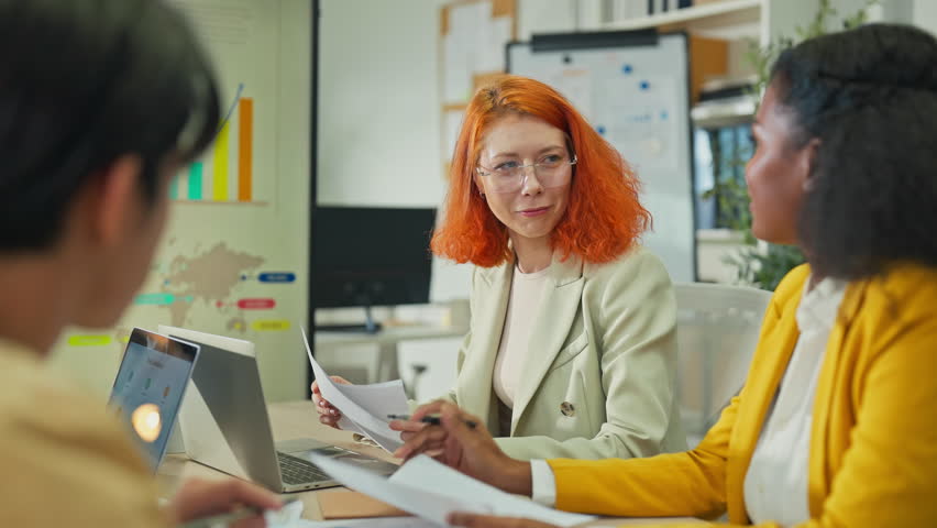 Diverse multiethnic fintech professionals collaborate in agile hackathon workshop, sharing adaptive business strategies through AI-powered big data analytics for exponential growth and convergent - Powered by Shutterstock - Get 15% off with code: PIKWIZARD15