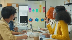 Diverse multiethnic fintech professionals collaborate in agile hackathon workshop, sharing adaptive business strategies through AI-powered big data analytics for exponential growth and convergent - Powered by Shutterstock - Get 15% off with code: PIKWIZARD15