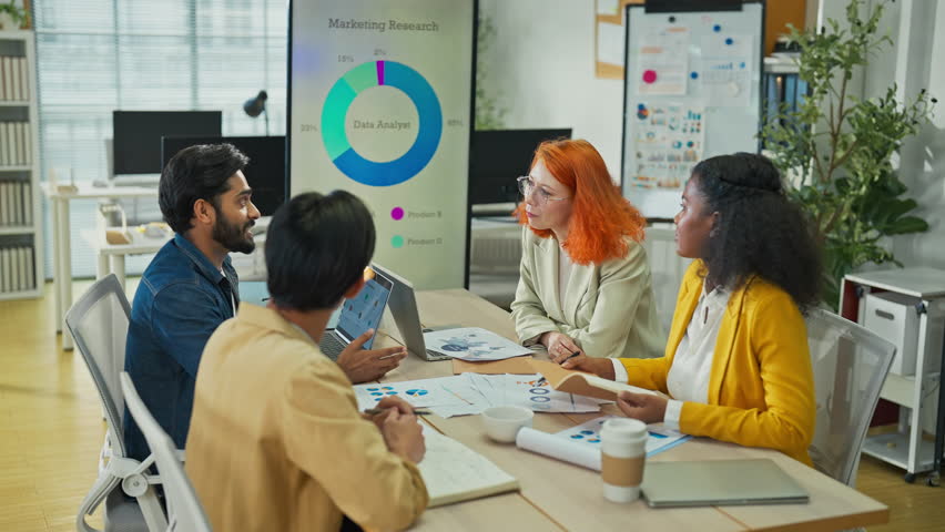 Diverse multiethnic fintech professionals collaborate in agile hackathon workshop, sharing adaptive business strategies through AI-powered big data analytics for exponential growth and convergent - Powered by Shutterstock - Get 15% off with code: PIKWIZARD15