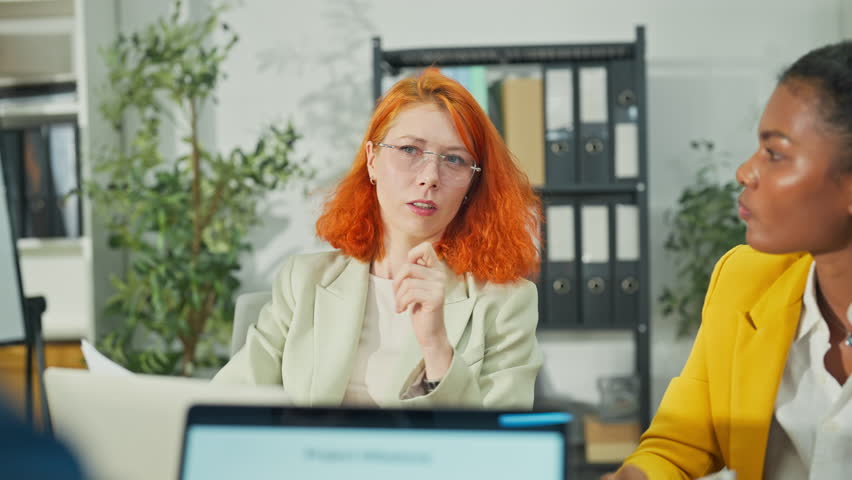 Diverse multiethnic fintech professionals collaborate in agile hackathon workshop, sharing adaptive business strategies through AI-powered big data analytics for exponential growth and convergent - Powered by Shutterstock - Get 15% off with code: PIKWIZARD15