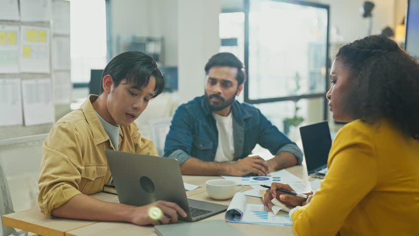 Diverse multiethnic fintech professionals collaborate in agile hackathon workshop, sharing adaptive business strategies through AI-powered big data analytics for exponential growth and convergent - Powered by Shutterstock - Get 15% off with code: PIKWIZARD15