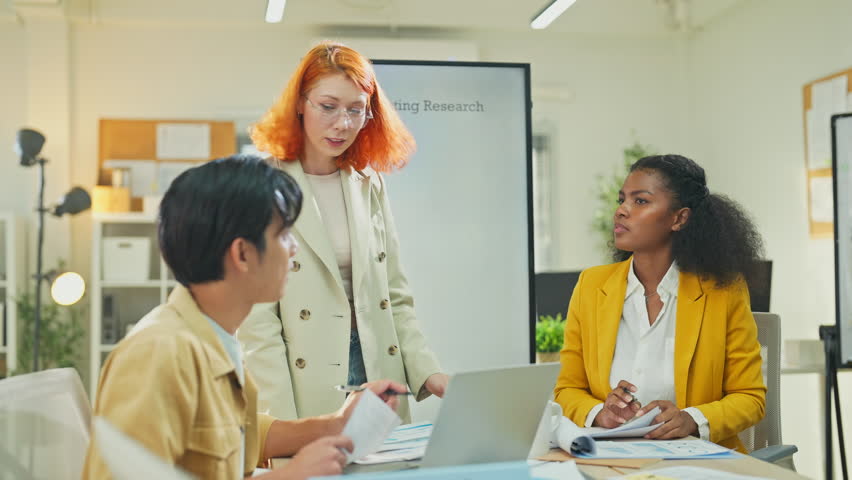 Diverse multiethnic fintech professionals collaborate in agile hackathon workshop, sharing adaptive business strategies through AI-powered big data analytics for exponential growth and convergent - Powered by Shutterstock - Get 15% off with code: PIKWIZARD15