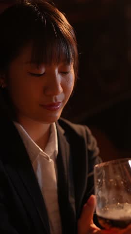 Closeup business woman holding a glass of wine