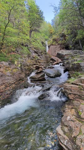 Waterfall in a wild gorge in beautiful nature in northern Norway