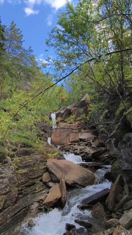 Waterfall in a wild gorge in beautiful nature in northern Norway