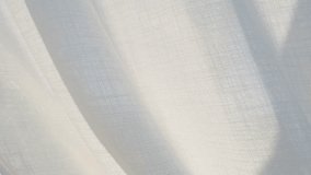 White curtain swaying in the wind. Flowing white curtain in gentle breeze. Soft white fabric moving gracefully in the wind. - Powered by Shutterstock - Get 15% off with code: PIKWIZARD15