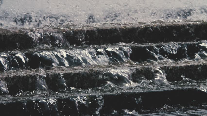 Water Splashes and Flows Down the Small Steps Slow Mo Summer