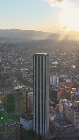 Sunset Colpatria Tower At Bogota In District Capital Colombia. Illuminated Downtown. Sunset City Landscape. Bogota At District Capital Colombia. Financial District. Night City Scene.