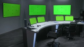 Empty Futuristic Control Room Console with Multiple Green Screen Monitors and Tracking Markers for Chroma Key VFX Replacement - Powered by Shutterstock - Get 15% off with code: PIKWIZARD15