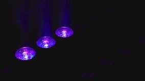 Vibrant RGB stage lights casting dynamic beams in multiple colors, creating an electrifying atmosphere perfect for concerts, festivals, and night events with immersive illumination. - Powered by Shutterstock - Get 15% off with code: PIKWIZARD15