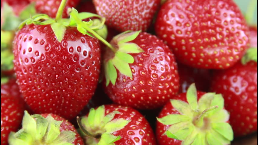 Ripe Strawberry Rotating With Selective Focus on Fresh Red Fruits in Slow Motion