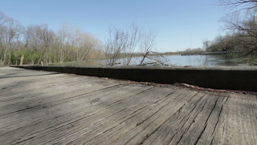 Bridge over swamp lake jib shot