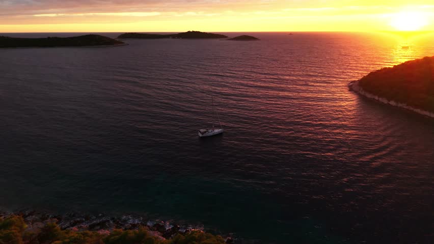 Drone footage of beautiful sunset over Rogoznica town archipelago in central Dalmatia Croatia