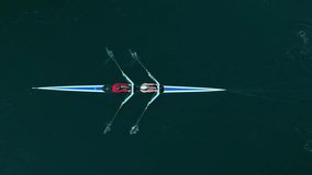 Top View, Epic View Of A Rowing Boat Carrying Two Athletes Racing Through The Gentle Waves Of Halifax Bay, Nova Scotia. Captured At Sunrise With Reflections Dancing On The Water Surface. - Powered by Shutterstock - Get 15% off with code: PIKWIZARD15
