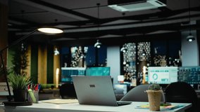 Empty corporate boardroom at night glows with digital displays of performance metrics, graphs and projections. Modern workspace in a multinational company reflects business management. - Powered by Shutterstock - Get 15% off with code: PIKWIZARD15