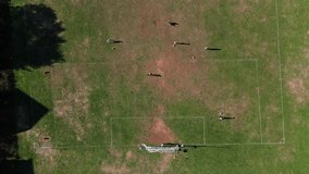 Top View Drone Captures Youth Football Training Session, With Kicks, Running, And Goal Practice On A Natural Field Surrounded By Sunshine And Nature In Nova Scotia.Teens Playing Soccer On Field - Powered by Shutterstock - Get 15% off with code: PIKWIZARD15