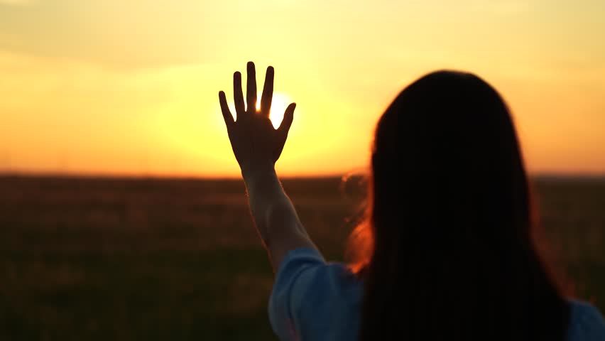 Sunlight through young woman