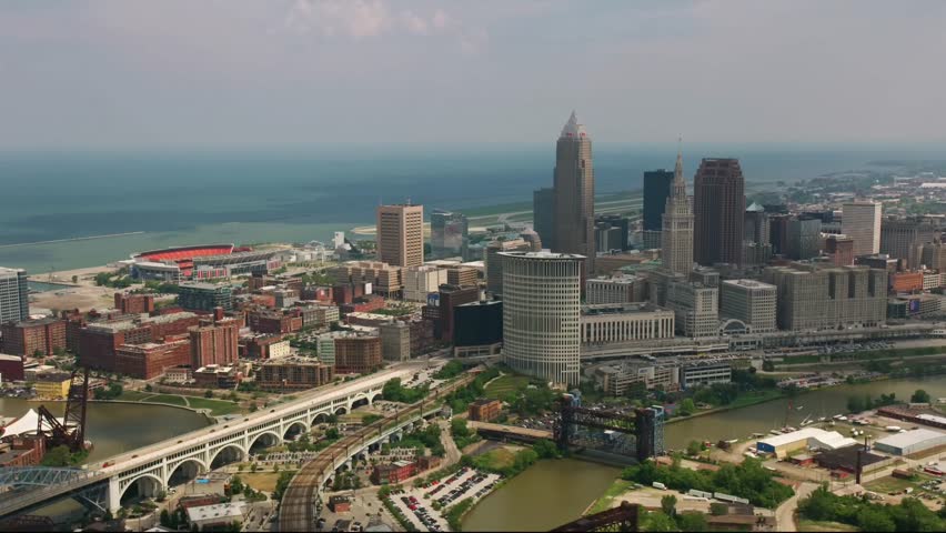 The Cincinnati skyline, featuring downtown, Mount Adams and the Ohio River in bright weather, incorporates bridges, city buildings, urban landscapes, and beautiful riverfront neighborhoods