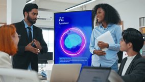 Diverse creative team use Ai Assistant (artificial intelligence assistant) on AI-assisted display for Marketing Data Analyst meeting at office.Coding team,develop Ai Assistant,business brainstorming - Powered by Shutterstock - Get 15% off with code: PIKWIZARD15
