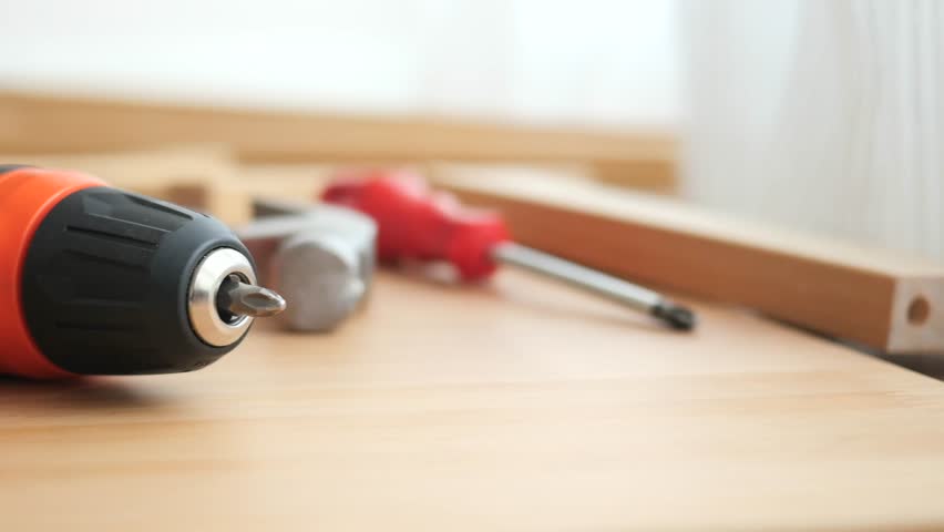 Woodworking tools in use at a home workshop setting