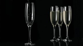 Bubbly stream filling left flute while red hearts floating around three glasses celebrating love. Luxury, celebration, elegance, romantic, sparkle, glamour, still life - Powered by Shutterstock - Get 15% off with code: PIKWIZARD15