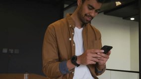 Office worker tapping smartphone and activating commerce overlay with cart lock icons while calling. Technology, digital, connectivity, innovation, business, communication, modernity - Powered by Shutterstock - Get 15% off with code: PIKWIZARD15