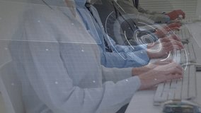 Colleagues typing on keyboards initiating HUD overlay fading and rotating for data visualization. Technology, digital, interface, data, corporate, futuristic, analytical - Powered by Shutterstock - Get 15% off with code: PIKWIZARD15