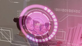 Mid-adult doctor starting typing keyboard activating HUD overlay reviewing live medical data stream. Technology, healthcare, professional, digital, innovation, analytics, communication - Powered by Shutterstock - Get 15% off with code: PIKWIZARD15