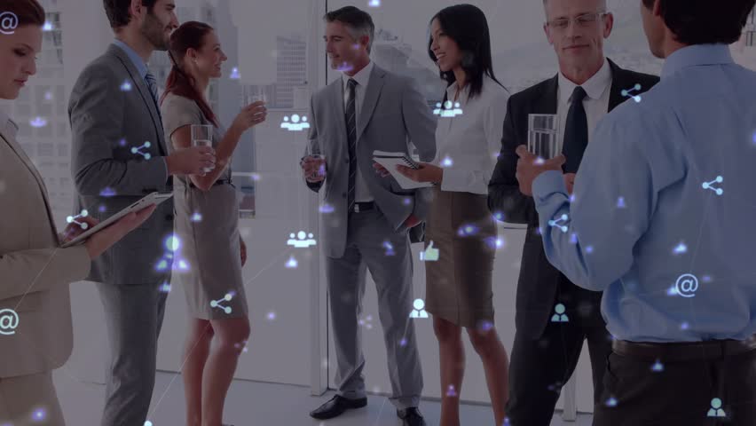 Business professionals using tablet in reception while social icons floating and driving networking. Corporate, networking, communication, modern, collaboration, professional, technology