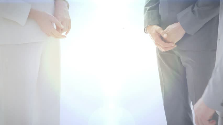 Business team entering frame and lifting digital globe while shaking hands and signifying deal. Collaboration, partnership, corporate, teamwork, innovation, global, professional - Powered by Shutterstock - Get 15% off with code: PIKWIZARD15