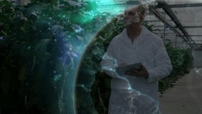 Greenhouse scientist scanning plants with tablet, activating globe streaming crop data for analysis. Botany, innovation, technology, sustainability, research, precision agriculture, environmental - Powered by Shutterstock - Get 15% off with code: PIKWIZARD15