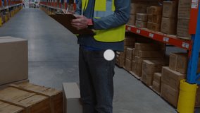 Warehouse worker writing inventory notes in aisle, digital nodes popping up around shelving. Logistics, industrial, technology, inventory, connectivity, supply chain, data visualization - Powered by Shutterstock - Get 15% off with code: PIKWIZARD15