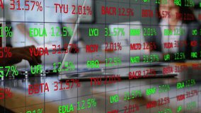 Team scanning scrolling tickers on transparent grid fist bumping after shift then typing on laptop. Financial analysis, teamwork, data visualization, corporate, professional, collaboration, success - Powered by Shutterstock - Get 15% off with code: PIKWIZARD15