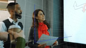 Mature presenter activating bar chart overlay and pointing upward trend arrow for business analysis. Collaboration, analytics, professional, data visualization, teamwork, modern, strategy - Powered by Shutterstock - Get 15% off with code: PIKWIZARD15