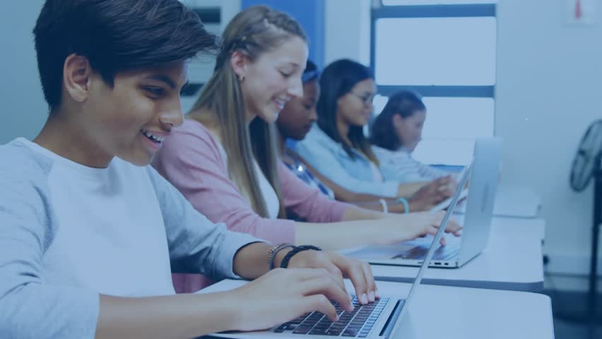 Students typing laptops starting network expansion across class in tech lab with nodes linking data. Collaboration, technology, digital, networking, education, innovation, teamwork - Powered by Shutterstock - Get 15% off with code: PIKWIZARD15