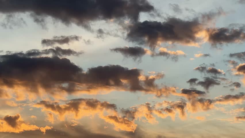 Majestic, Gorgeous, Beautiful Alberta, Canada, sunset sky, with vibrant orange and pink clouds over open prairie landscape, capturing the calm and colourful evening light across the rural horizon.