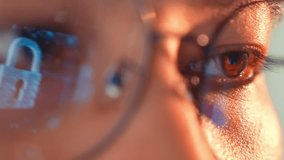 A person wearing glasses is reflected with a digital padlock, symbolizing data privacy, online security, personal information protection, and the significance of safeguarding digital identities.
 - Powered by Shutterstock - Get 15% off with code: PIKWIZARD15