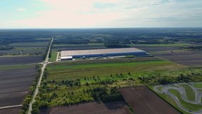 Birds-eye view of a modern logistics center with vast warehouses - Powered by Shutterstock - Get 15% off with code: PIKWIZARD15