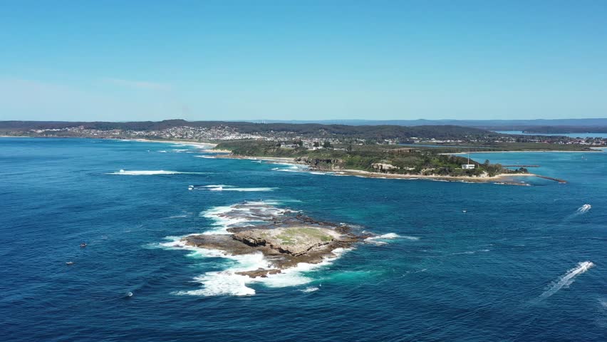 Swansea heads around green island on Pacific coast of Australia.